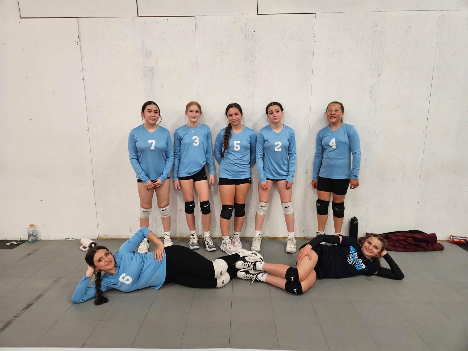 Zapata VBC players in light blue jerseys