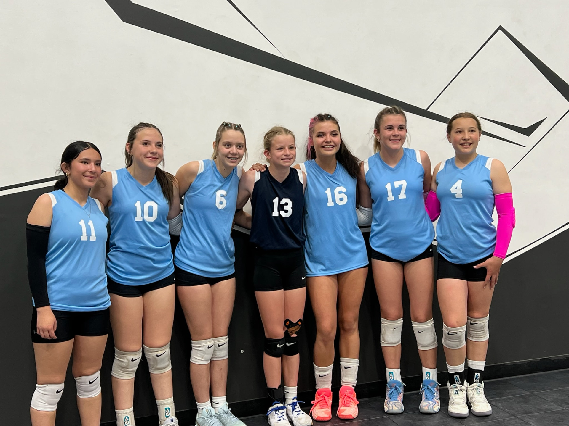 Zapata VBC team portrait in light blue jerseys