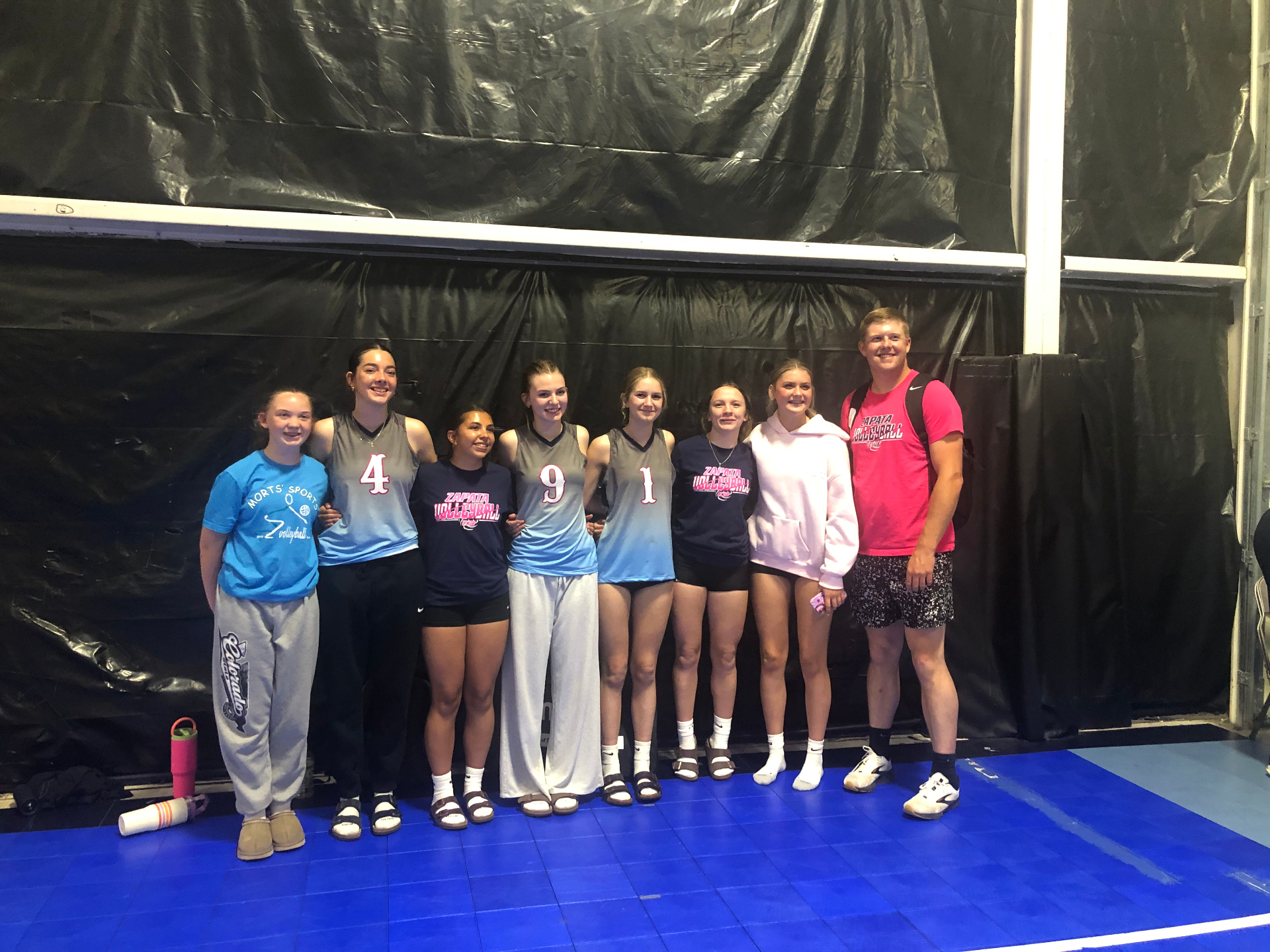 Zapata VBC team and coach after a match at a tournament